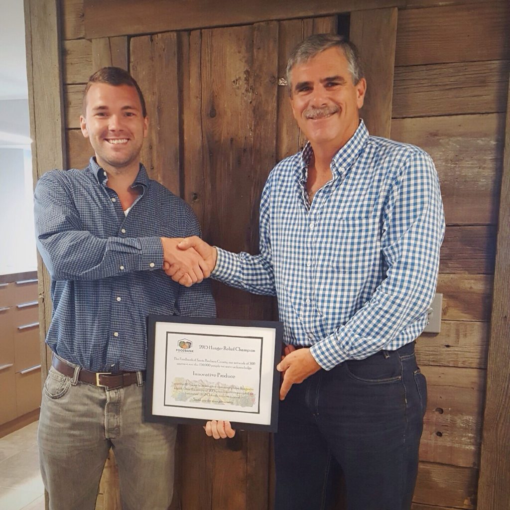  You can tell roots are deep in Santa Barbara County from the 120 year old wooden door behind Foodbank SBC COO Jamie Nichols and George receiving his Hunger Relief Champion certificate! 